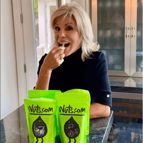 Woman with many Nuts.com bags